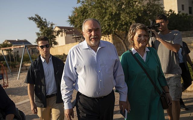 Israel Beytenu party chairman Avigdor Liberman and his wife cast their ballot at a voting station in the settlement of Nokdim, during the Knesset elections on September 17, 2019. (Hadas Parush/Flash90) Israel Beytenu party chairman Avigdor Liberman and his wife cast their ballot at a voting station in the settlement of Nokdim, during the Knesset elections on September 17, 2019. (Hadas Parush/Flash90)