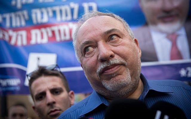 Yisrael Beytenu leader Avigdor Liberman speaks to press while touring the Sarona Market in Tel Aviv on election day, September 17, 2019. (Miriam Alster/Flash90) Yisrael Beytenu leader Avigdor Liberman speaks to press while touring the Sarona Market in Tel Aviv on election day, September 17, 2019. (Miriam Alster/Flash90)