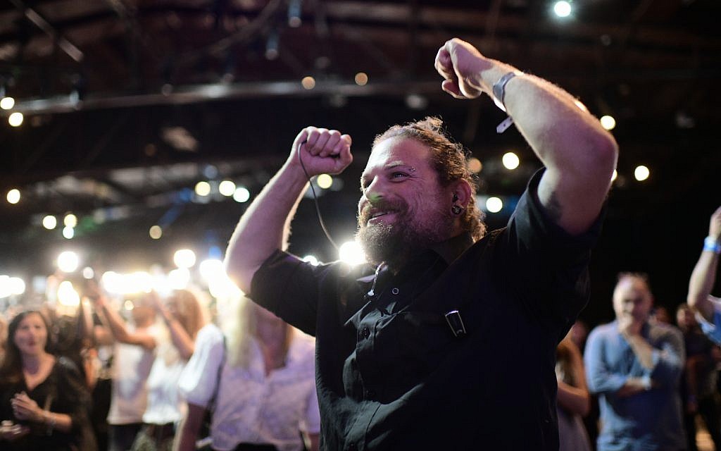 Supporters of the Blue and White party react as the exit polls are announced, September 17, 2019. (Tomer Neuberg/Flash90)