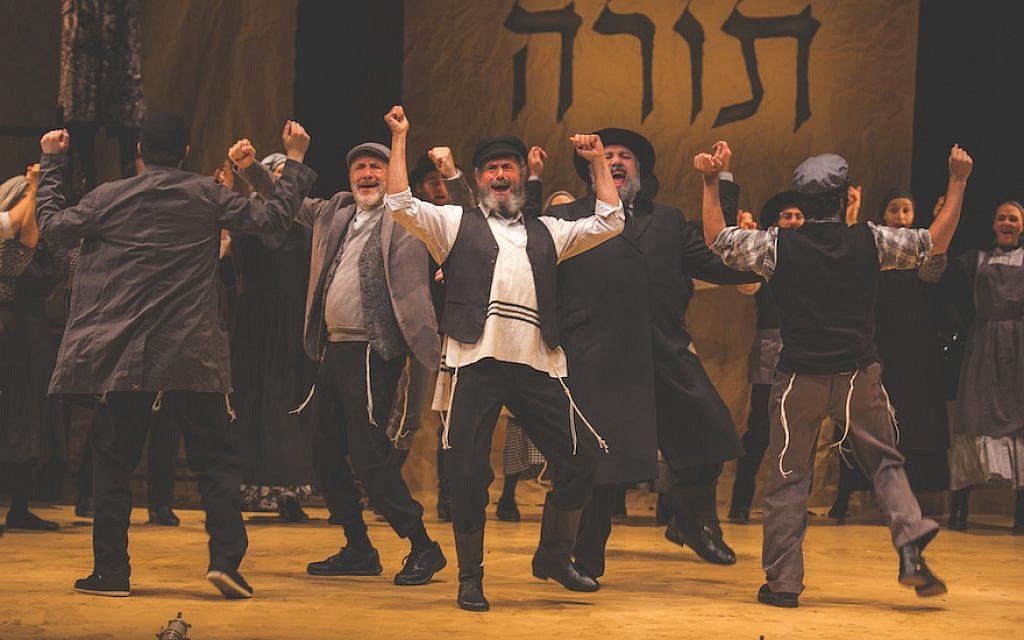 Steven Skybell (Tevye), center, and ensemble in National Yiddish Theatre Folksbiene's Production of 'Fiddler on the Roof.' (Victor Nechay/ProperPix via JTA)