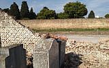 This photograph from the Argentinian Israelite Mutual Association shows damage to a Jewish cemetery in La Tablada, Argentina, which was vandalized on September 28, 2019. (AMIA)