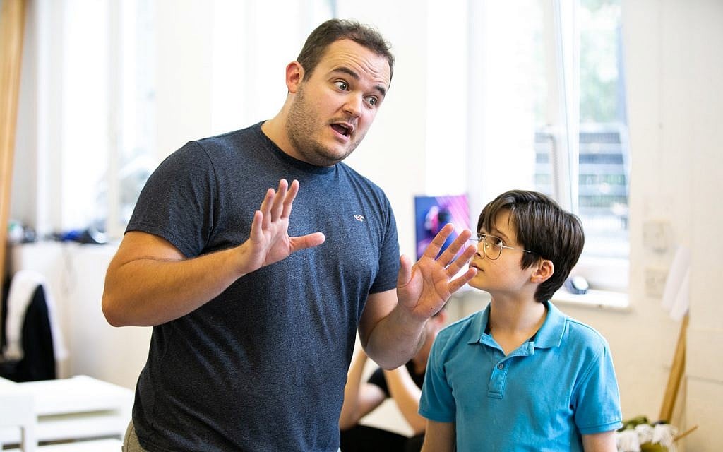 Joel Montague as Mendel, left, and Albert Atack as Jason, right, during a rehearsal for the UK production of 'Falsettos,' which contains no known Jewish actors. (Matthew Walker)