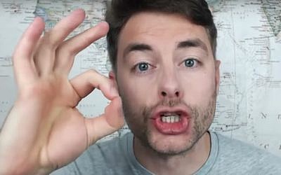 Screen capture from video of a man demonstrating the 'OK' hand gesture. (YouTube)