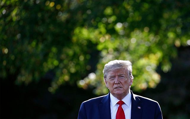 US President Donald Trump walks from the Oval Office to speak with reporters before departing on Marine One from the South Lawn of the White House, September 16, 2019, in Washington. (AP Photo/Patrick Semansky) US President Donald Trump walks from the Oval Office to speak with reporters before departing on Marine One from the South Lawn of the White House, September 16, 2019, in Washington. (AP Photo/Patrick Semansky)