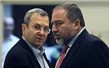Then-defense minister Ehud Barak, left, and then-foreign minister Avigdor Liberman, right, arrive at a weekly cabinet meeting at the Prime Minister's office in Jerusalem, November 13,  2011. (Kobi Gideon/Flash90)
