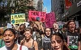 Illustrative: Climate change activists participate in an environmental demonstration as part of a global youth-led day of action, September 20, 2019, in New York. (AP Photo/Bebeto Matthews)