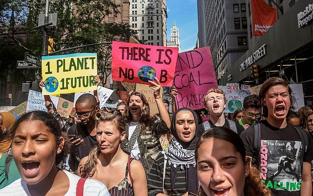 Illustrative: Climate change activists participate in an environmental demonstration as part of a global youth-led day of action, September 20, 2019, in New York. (AP Photo/Bebeto Matthews) Illustrative: Climate change activists participate in an environmental demonstration as part of a global youth-led day of action, September 20, 2019, in New York. (AP Photo/Bebeto Matthews)
