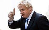 Britain's Prime Minister Boris Johnson gestures as he departs from Hudson Yards, in New York, September 24, 2019. (AP Photo/Matt Rourke)
