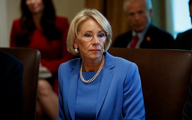 Education Secretary Betsy DeVos listens during a Cabinet meeting in the Cabinet Room of the White House in Washington, July 16, 2019. (AP Photo/Alex Brandon, File)