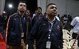 Indian Space Research Organization (ISRO) employees react as they listen to an announcement by organizations's chief Kailasavadivoo Sivan at its Telemetry, Tracking and Command Network facility in Bangalore, India, September 7, 2019. (AP Photo/Aijaz Rahi)
