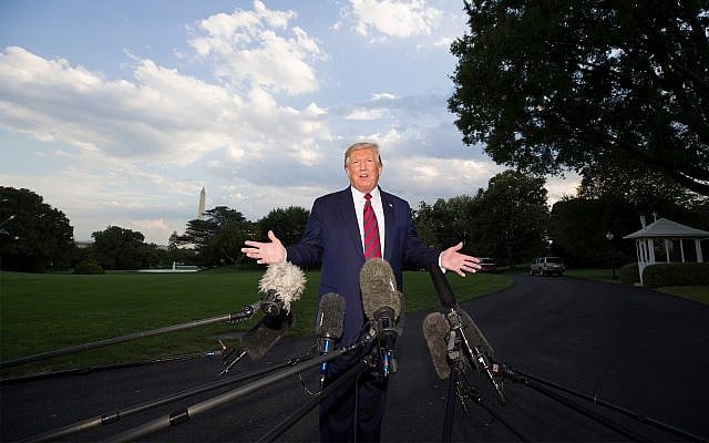 US President Donald Trump speaks with reporters before departing on Marine One from the South Lawn of the White House, September 12, 2019, in Washington. (AP Photo/Alex Brandon) US President Donald Trump speaks with reporters before departing on Marine One from the South Lawn of the White House, September 12, 2019, in Washington. (AP Photo/Alex Brandon)