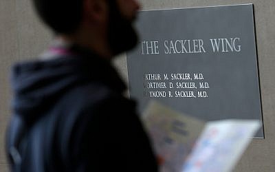 A sign with the Sackler name at the Metropolitan Museum of Art in New York, January 17, 2019. (AP Photo/Seth Wenig)