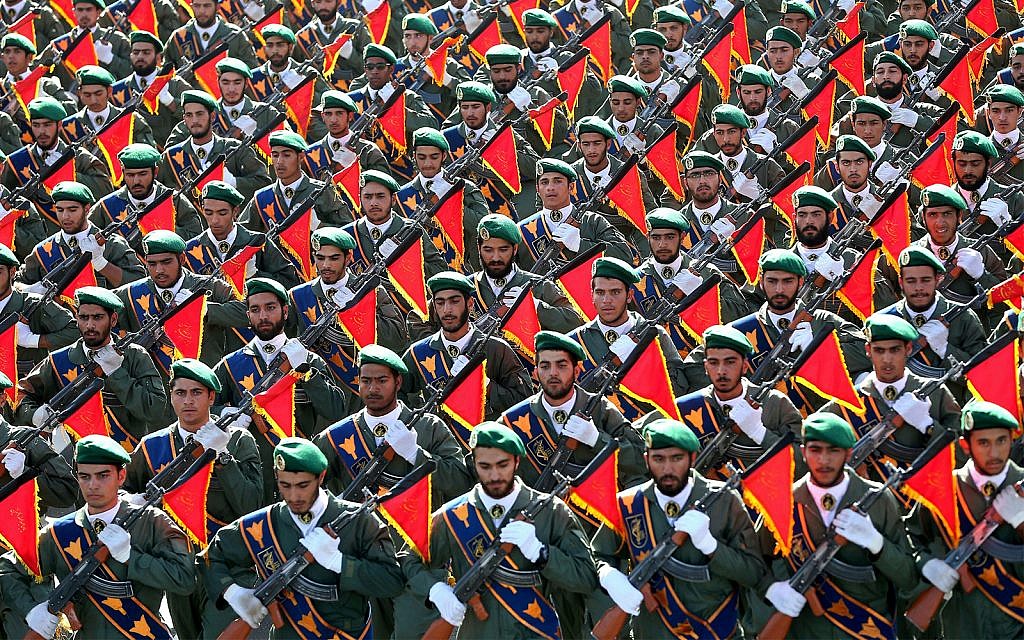 Iran's Revolutionary Guard troops march in a military parade marking the 36th anniversary of Iraq's 1980 invasion of Iran, in front of the shrine of late revolutionary founder Ayatollah Khomeini, just outside Tehran, Iran, September 21, 2016. (AP Photo/Ebrahim Noroozi, File) Iran's Revolutionary Guard troops march in a military parade marking the 36th anniversary of Iraq's 1980 invasion of Iran, in front of the shrine of late revolutionary founder Ayatollah Khomeini, just outside Tehran, Iran, September 21, 2016. (AP Photo/Ebrahim Noroozi, File)