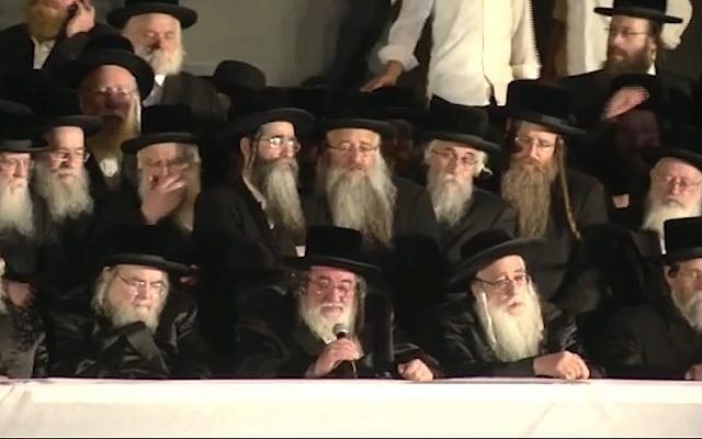 Screen capture from video of Rabbi Yisroel Hager, leader of the Vizhnitz Hasidic sect, front row center, speaking during a United Torah Judaism election campaign rally in Jerusalem, September 15, 2019. (YouTube) Screen capture from video of Rabbi Yisroel Hager, leader of the Vizhnitz Hasidic sect, front row center, speaking during a United Torah Judaism election campaign rally in Jerusalem, September 15, 2019. (YouTube)