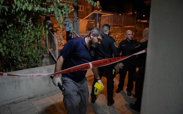 Illustrative: Police inspect the scene of a murder in the northern city of Nazareth on September 23, 2019. (Israel Police Spokesperson) Illustrative: Police inspect the scene of a murder in the northern city of Nazareth on September 23, 2019. (Israel Police Spokesperson)