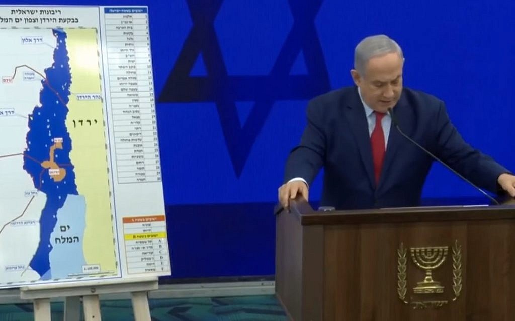 Prime Minister Benjamin Netanyahu delivering a campaign address next to a map of proposed areas of the West Bank for annexation on September 10, 2019. (screen capture: Facebook) Prime Minister Benjamin Netanyahu delivering a campaign address next to a map of proposed areas of the West Bank for annexation on September 10, 2019. (screen capture: Facebook)