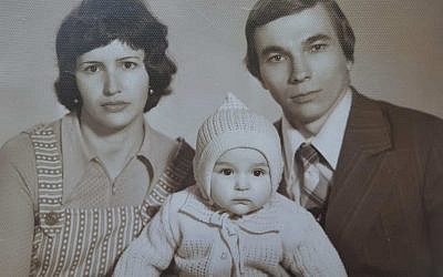 Ira Tolchin Immergluck as a baby with her parents (via Zman Yisrael)