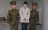 American student Otto Frederick Warmbier, center, arrives at a court for his trial in Pyongyang, capital of the Democratic People's Republic of Korea, on March 16, 2015. (Xinhua/ Lu Rui via Getty Images)