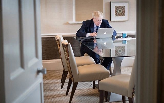 Britain's Prime Minister Boris Johnson prepares his keynote speech for the annual Conservative Party conference in Manchester, northwest England, on October 1, 2019 which he'll deliver on the final day on October 2. (Stefan Rousseau / POOL / AFP) Britain's Prime Minister Boris Johnson prepares his keynote speech for the annual Conservative Party conference in Manchester, northwest England, on October 1, 2019 which he'll deliver on the final day on October 2. (Stefan Rousseau / POOL / AFP)