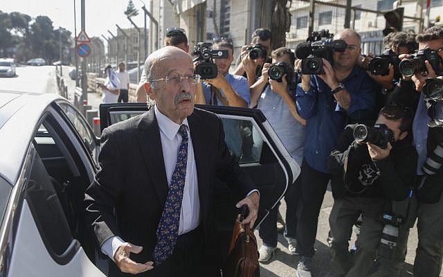 Prime Minister Benjamin Netanyahu's lawyer Ram Caspi arrives at the Justice Ministry headquarters in Jerusalem on October 2, 2019, for the start of Netanyahu's pre-indictment hearing. (Menahem Kahana/AFP)
