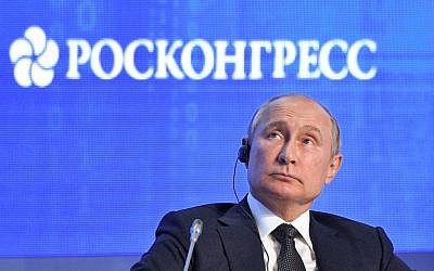 Russian President Vladimir Putin attends a session of the 2019 Russian Energy Week forum in Moscow, on October 2, 2019. (Aleksey Nikolskyi / Sputnik / AFP)