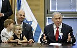 Prime Minister Benjamin Netanyahu (R) speaks during a Likud faction meeting at the Knesset in Jerusalem on October 3, 2019. (Emmanuel Dunand/AFP)