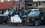 Iraqi security forces keep watch at Tahrir Square in central Baghdad on October 5, 2019, after a curfew was lifted following a day of violent protests. (Ahmad Al-Rubaye/AFP)