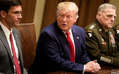 US Secretary of Defense Mark Esper (L) and Chairman of the Joint Chiefs of Staff Army General Mark A. Milley (R) listen while US President Donald Trump speaks before a meeting with senior military leaders in the Cabinet Room of the White House in Washington DC on October 7, 2019. (Brendan Smialowski / AFP)