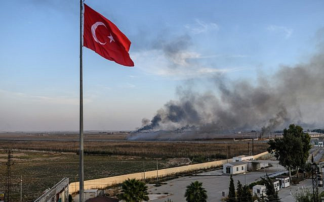 Smoke rises from the Syrian town of Tal Abyad, in a picture taken from the Turkish side of the border in Akcakale on October 10, 2019, on the second day of Turkey's military operation against Kurdish forces. (Bulent Kilic/AFP) Smoke rises from the Syrian town of Tal Abyad, in a picture taken from the Turkish side of the border in Akcakale on October 10, 2019, on the second day of Turkey's military operation against Kurdish forces. (Bulent Kilic/AFP)