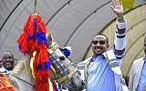 In this file photo taken on September 15, 2019, Ethiopian Prime Minister Abiy Ahmed gestures after receiving a horse as a gift from the elders of the Kafficho ethnic group during a visit to Bonga, the main town in Kaffa province, in southwestern Ethiopia. (Michael Tewlede/AFP)