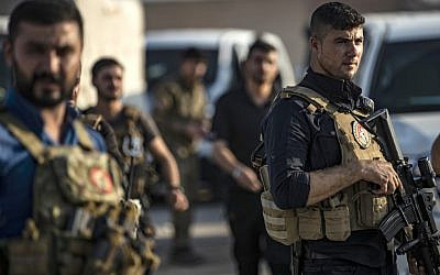 Members of the special forces of the Kurdish-led Syrian Democratic Forces (SDF) are pictured during preparations to join the front against Turkish forces, on October 10, 2019, near the northern Syrian town of Hasakeh.  (Delil SOULEIMAN / AFP)