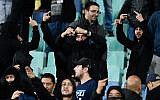 Bulgarian fans gesture during a Euro 2020 soccer match between Bulgaria and England at the Vasil Levski National Stadium in Sofia on October 14, 2019. (NIKOLAY DOYCHINOV / AFP)