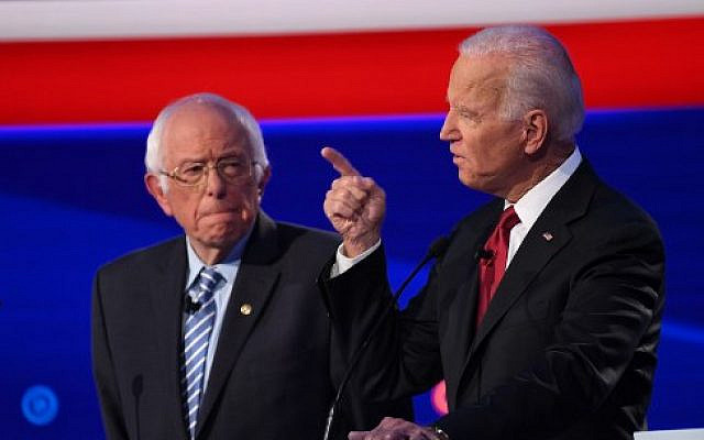 Democratic presidential hopefuls Vermont Senator Bernie Sanders (L) and former US Vice President Joe Biden during the fourth Democratic primary debate of the 2020 presidential campaign season co-hosted by The New York Times and CNN at Otterbein University in Westerville, Ohio on October 15, 2019. (SAUL LOEB/AFP) Democratic presidential hopefuls Vermont Senator Bernie Sanders (L) and former US Vice President Joe Biden during the fourth Democratic primary debate of the 2020 presidential campaign season co-hosted by The New York Times and CNN at Otterbein University in Westerville, Ohio on October 15, 2019. (SAUL LOEB/AFP)