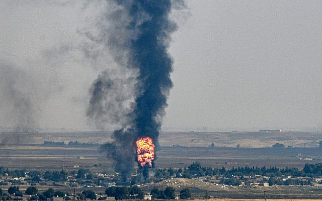 This picture taken on October 17, 2019, from the Turkish side of the border with Syria in the Ceylanpinar district city of Sanliurfa, shows smoke and fire rising from the Syrian town of Ras al-Ain during the Turkish offensive against Kurdish groups in northeastern Syria. (Ozan Kose/AFP) This picture taken on October 17, 2019, from the Turkish side of the border with Syria in the Ceylanpinar district city of Sanliurfa, shows smoke and fire rising from the Syrian town of Ras al-Ain during the Turkish offensive against Kurdish groups in northeastern Syria. (Ozan Kose/AFP)