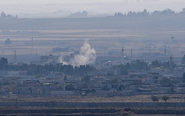 This picture taken on October 18, 2019 from the Turkish side of the border in Ceylanpinar shows smoke rising from the Syrian town of Ras al-Ain on the first week of Turkey's military operation against Kurdish forces. (Ozan KOSE / AFP) This picture taken on October 18, 2019 from the Turkish side of the border in Ceylanpinar shows smoke rising from the Syrian town of Ras al-Ain on the first week of Turkey's military operation against Kurdish forces. (Ozan KOSE / AFP)