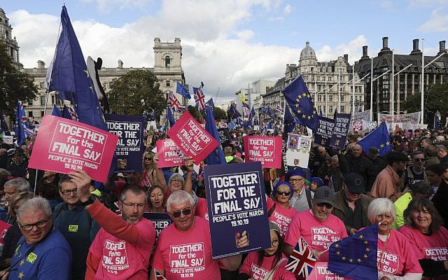 Demonstrators with placards and EU and Union flags gather in Parliament Square in central London on October 19, 2019, as they take part in a rally by the People's Vote organisation calling for a final say in a second referendum on Brexit (ISABEL INFANTES / AFP) Demonstrators with placards and EU and Union flags gather in Parliament Square in central London on October 19, 2019, as they take part in a rally by the People's Vote organisation calling for a final say in a second referendum on Brexit (ISABEL INFANTES / AFP)