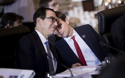 In this photo from July 19, 2017, White House senior advisor Jared Kushner (R) whispers to US Secretary of the Treasury Steven Mnuchin during a US and China comprehensive Economic Dialogue at the Treasury Department Washington. (Brendan Smialowski/AFP)