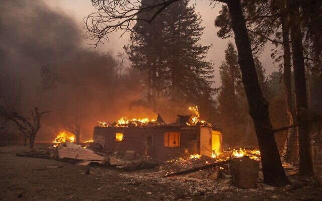 A home burns during the Kincade fire near Geyserville, California on October 24, 2019. (Josh Edelson / AFP) A home burns during the Kincade fire near Geyserville, California on October 24, 2019. (Josh Edelson / AFP)