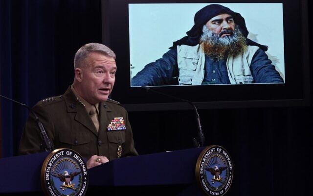 US Marine Corps General Kenneth "Frank" McKenzie, commander of US Central Command, speaks as a picture of Abu Bakr al-Baghdadi is seen during a press briefing October 30, 2019 at the Pentagon in Arlington, Virginia. (Alex Wong/Getty Images/AFP) US Marine Corps General Kenneth "Frank" McKenzie, commander of US Central Command, speaks as a picture of Abu Bakr al-Baghdadi is seen during a press briefing October 30, 2019 at the Pentagon in Arlington, Virginia. (Alex Wong/Getty Images/AFP)