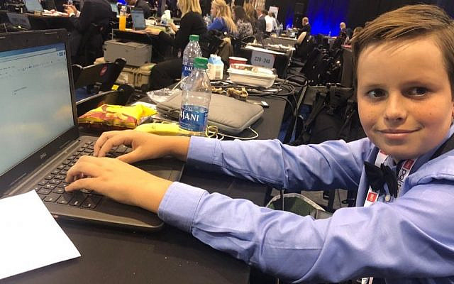 Shawn Fairbairn, Kids Scoop News reporter, reporting from the Democratic debate in Westerville, Ohio, Oct. 15, 2019. (Ron Kampeas) Shawn Fairbairn, Kids Scoop News reporter, reporting from the Democratic debate in Westerville, Ohio, Oct. 15, 2019. (Ron Kampeas)
