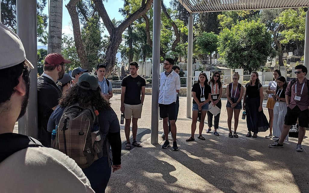 Students gather for a debriefing session on J Street's 'Let Our People Know' trip to Israel and the West Bank in July 2019 (Courtesy)