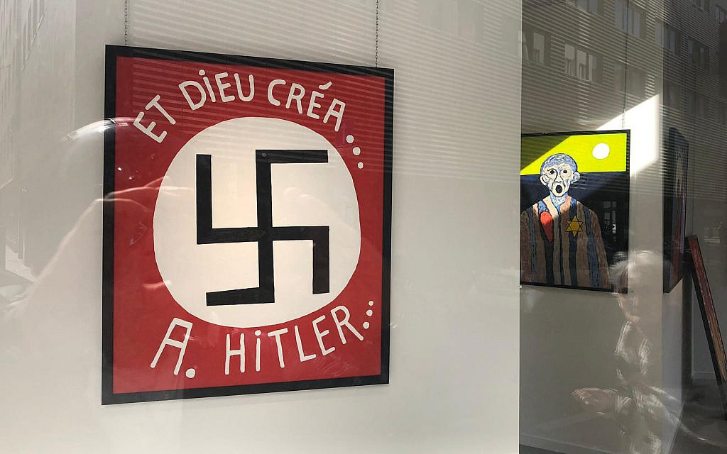 A Belgian politician presented this painting featuring a large swastika at the Bog-Art Gallery in Brussels. (Courtesy of LBCA/via JTA) A Belgian politician presented this painting featuring a large swastika at the Bog-Art Gallery in Brussels. (Courtesy of LBCA/via JTA)
