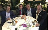 This Facebook screenshot provided by The Campaign Legal Center, shows from left, Donald Trump, Jr., Tommy Hicks, Jr., Lev Parnas and Igor Fruman, posted on May 21, 2018. (The Campaign Legal Center via AP)