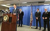 US attorney David Anderson announces criminal spy charges against San Francisco Bay Area tour operator Xuehua Edward Peng, September 30, 2019, in San Francisco. (AP Photo/Janie Har)