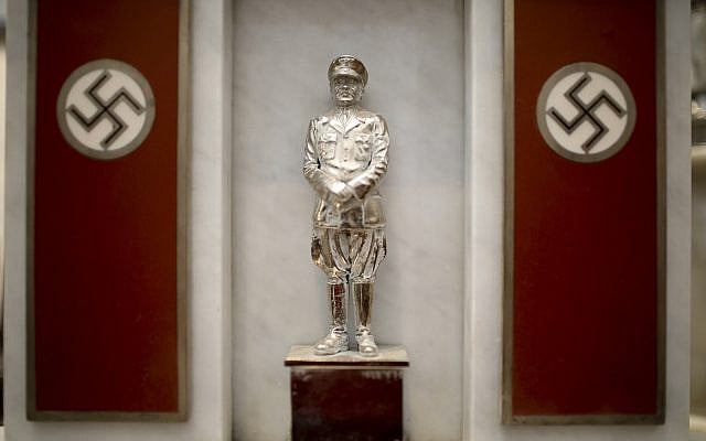 A statue of German Nazi leader Adolf Hitler discovered by police in 2017 is displayed during a press conference at the Holocaust museum in Buenos Aires, Argentina, October 2, 2019. (Natacha Pisarenko/AP)