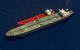 This satellite image made available October 3, 2019, shows two Iranian-flagged tankers, the Adrian Darya 1 and the Jasmine, with mooring lines tethering the two tankers together and a deployed crane on the starboard side of the Adrian Darya 1 off the coast of Syria. (Maxar Technologies via AP)