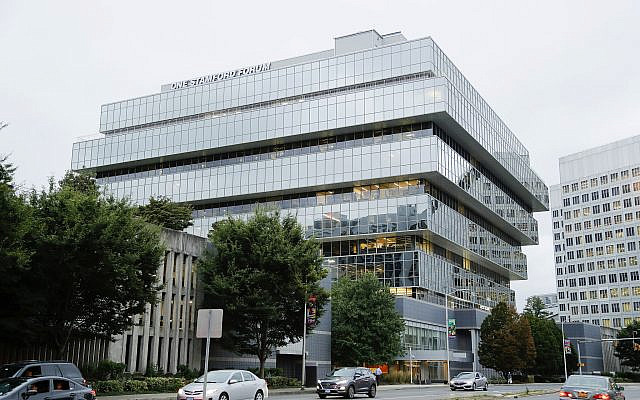 In this September 12, 2019, file photo, cars pass Purdue Pharma headquarters in Stamford, Connecticut. (AP Photo/Frank Franklin II, File) In this September 12, 2019, file photo, cars pass Purdue Pharma headquarters in Stamford, Connecticut. (AP Photo/Frank Franklin II, File)