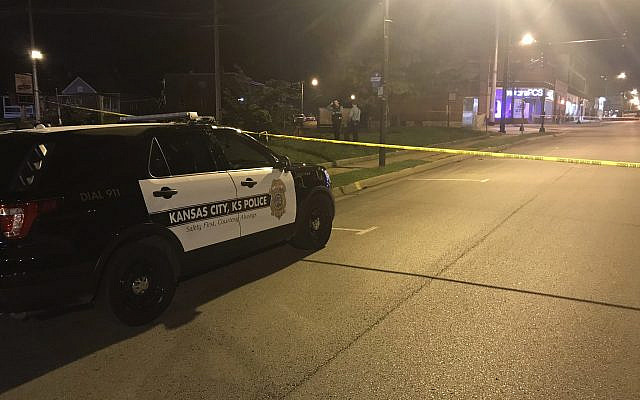 In this image from 41 KSHB Kansas City Action News police work the scene of a shooting outside a Kansas City, Kansas bar on October 6, 2019. (41 KSHB Kansas City Action News via AP) In this image from 41 KSHB Kansas City Action News police work the scene of a shooting outside a Kansas City, Kansas bar on October 6, 2019. (41 KSHB Kansas City Action News via AP)
