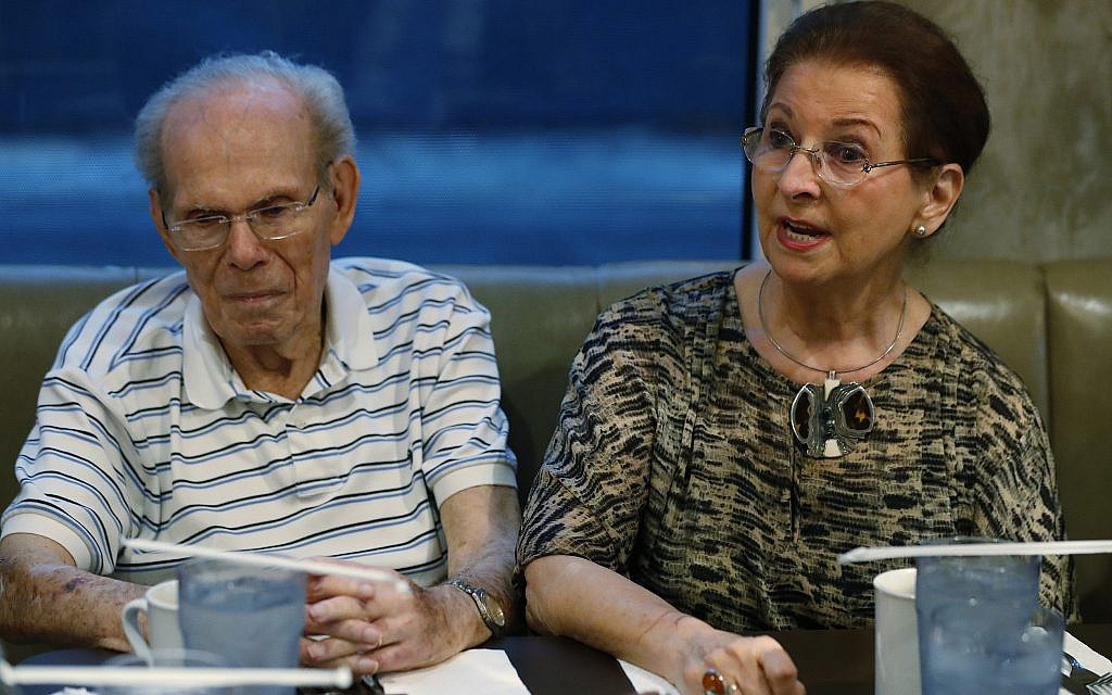In this, Monday, Oct. 7, 2019 photo, Vera Karliner, right, speaks during an interview with The Associated Press in Aventura, Fla., along with her husband Herb, left, who was on the ship named the St. Louis that was full of Jewish refugees but was turned away from the U.S. in 1939. Aging Holocaust survivors are trying to recover insurance benefits that were never honored by Nazi-era companies, which could be worth billions of dollars. (AP Photo/Wilfredo Lee) In this, Monday, Oct. 7, 2019 photo, Vera Karliner, right, speaks during an interview with The Associated Press in Aventura, Fla., along with her husband Herb, left, who was on the ship named the St. Louis that was full of Jewish refugees but was turned away from the U.S. in 1939. Aging Holocaust survivors are trying to recover insurance benefits that were never honored by Nazi-era companies, which could be worth billions of dollars. (AP Photo/Wilfredo Lee)