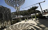 In this Oct. 8, 2019, photo, Associated Press journalists visit the Sustainability Pavilion at the under construction site of the Expo 2020 in Dubai, United Arab Emirates. (AP Photo/Kamran Jebreili)